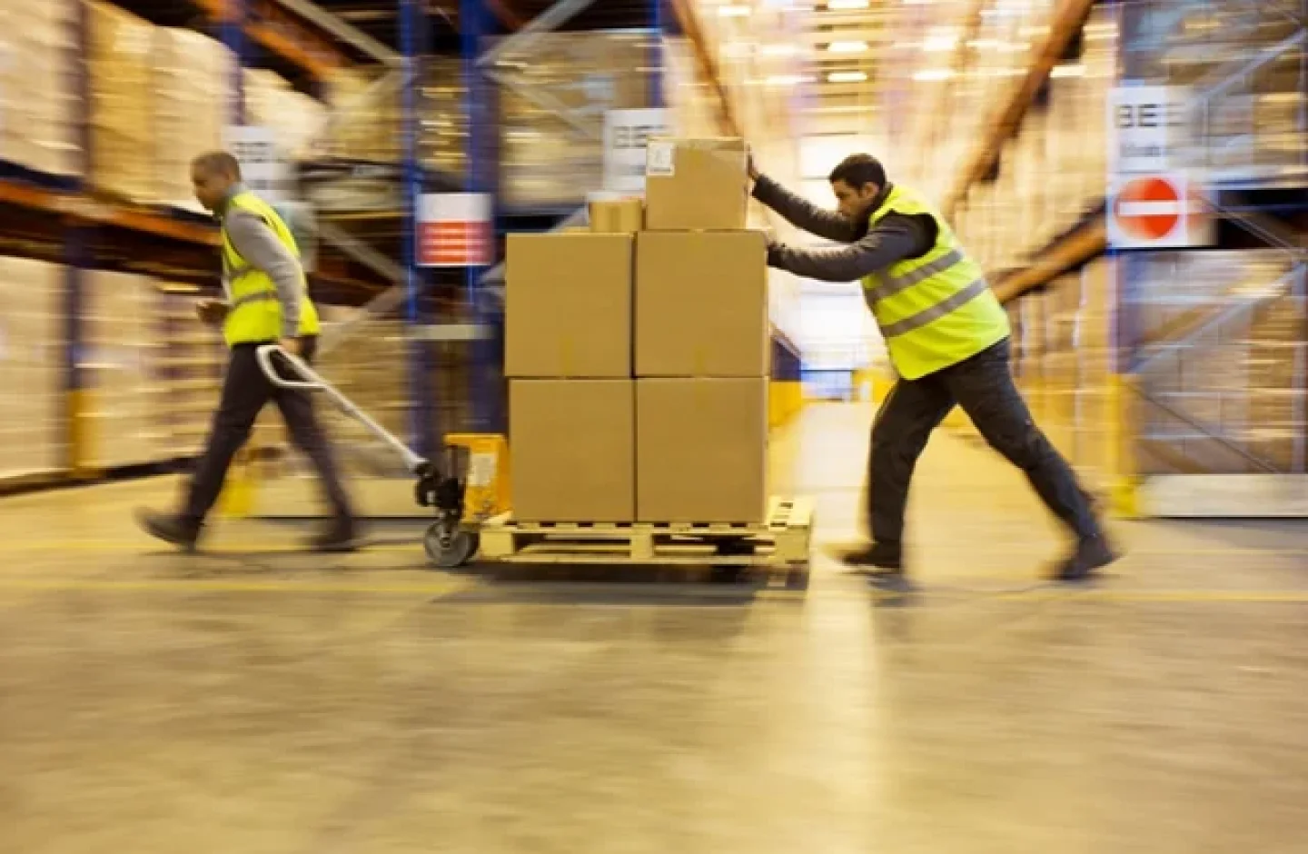 Warehouse employees efficiently order processing.