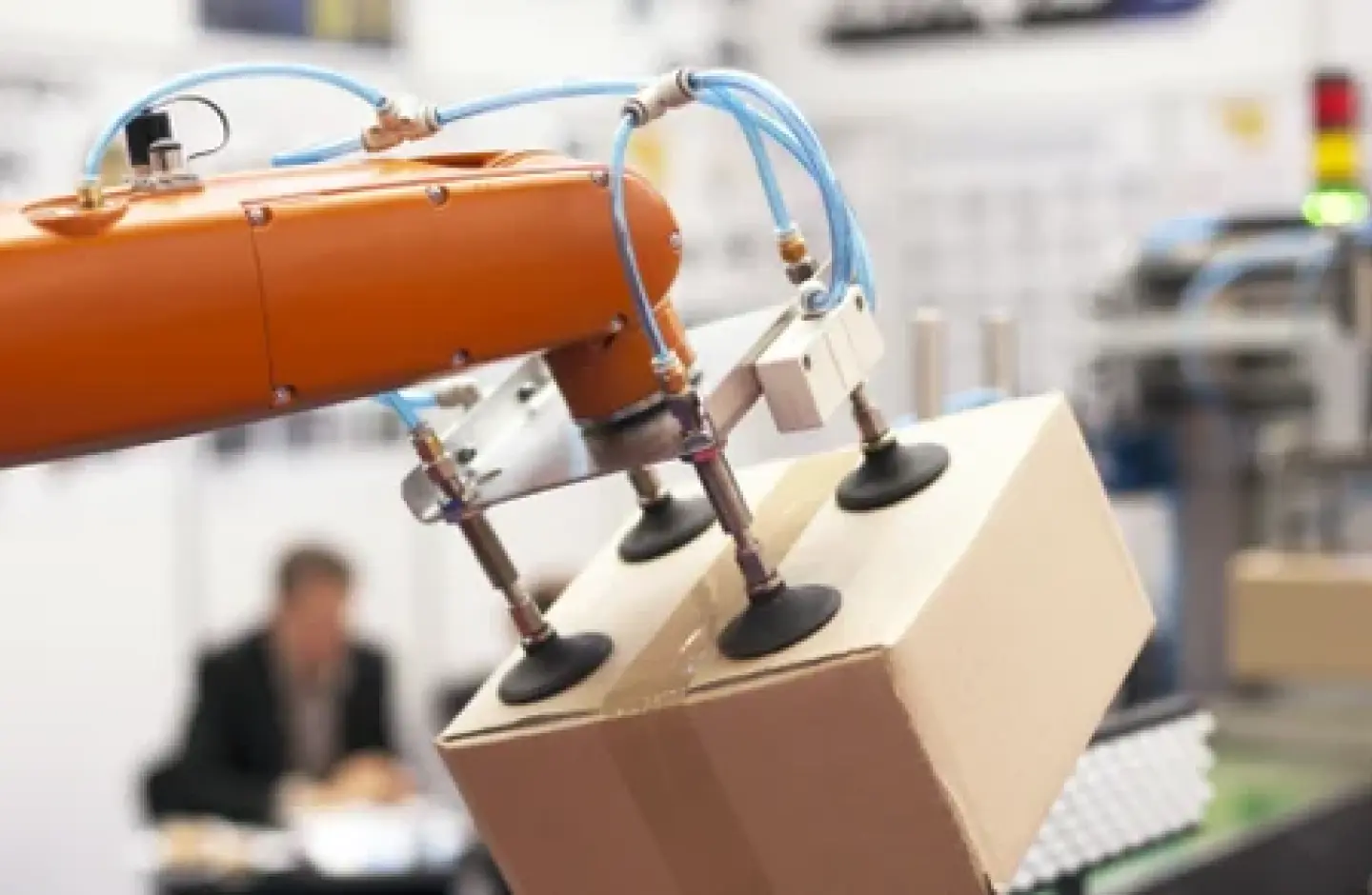 Robotic arm handling the picking in an automated warehouse.